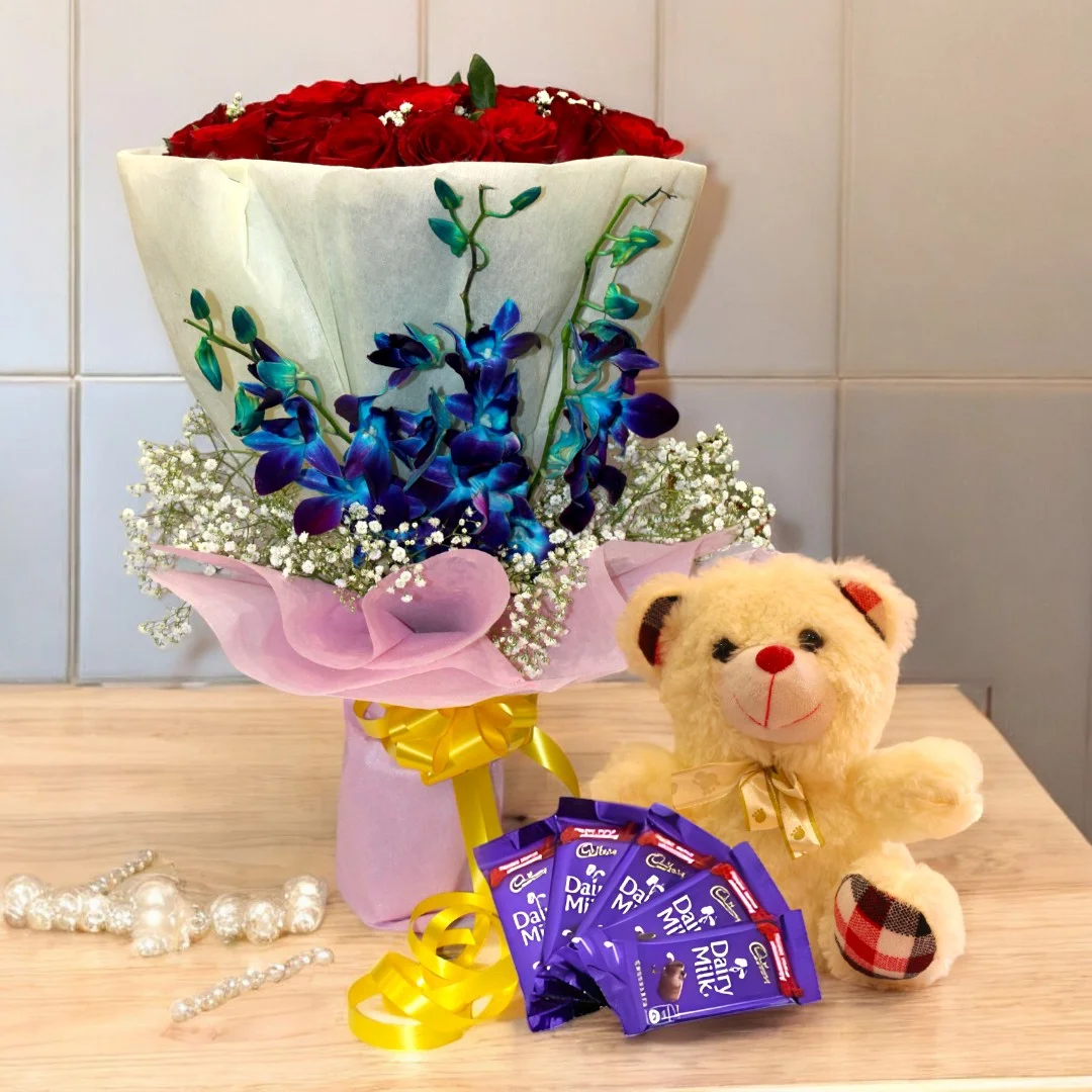 Deluxe Love Combo with Red Roses, Blue Orchids, Teddy & Chocolates